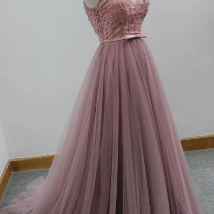 Pink Floor Length Tulle Formal Gown Featuring..