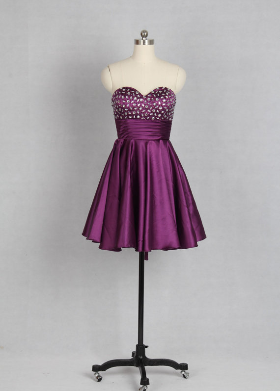 Purple Short Satin A-line Homecoming Dress Featuring Beaded Embellished Sweetheart Bodice, Ruched Belt And Lace-up Back