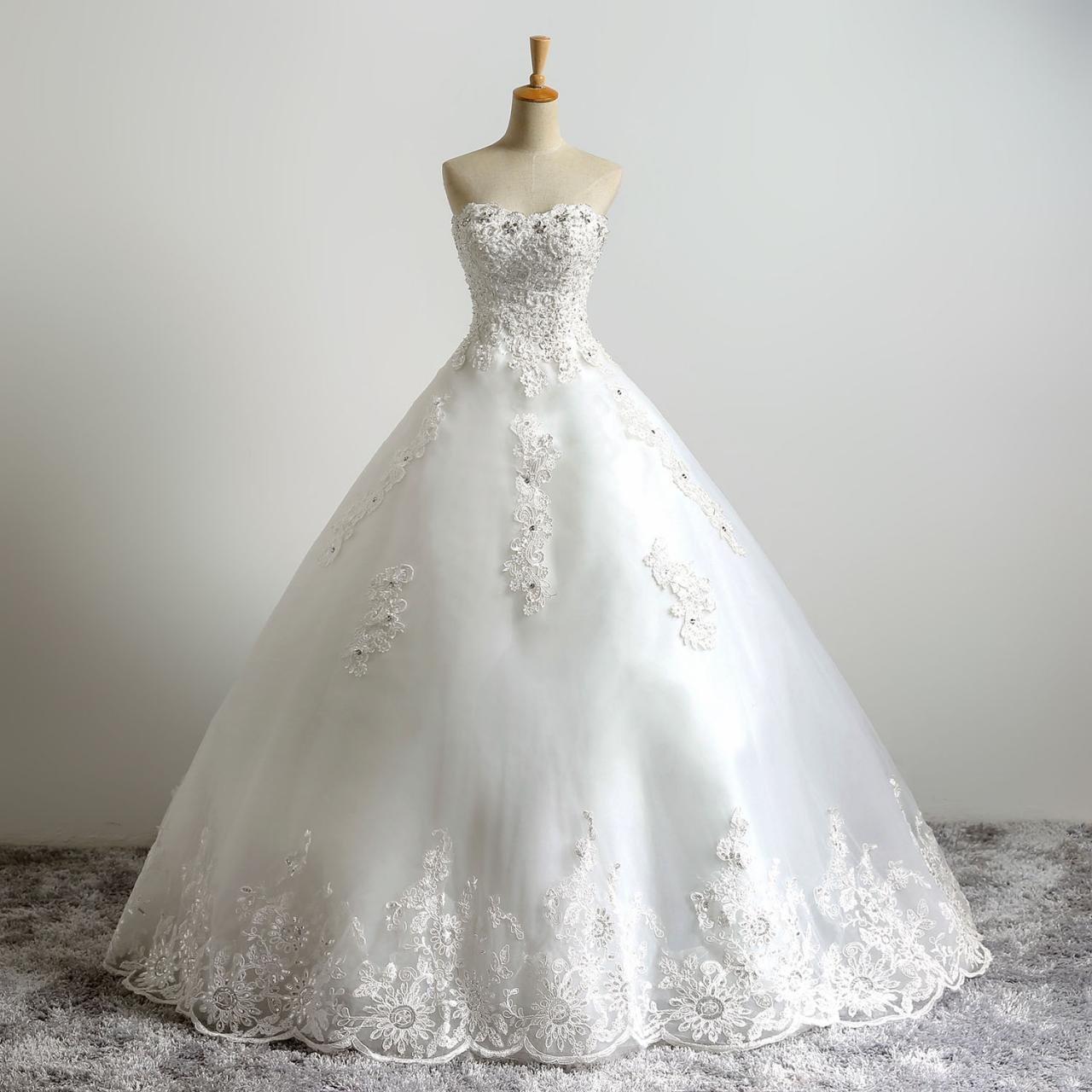 Ivory Floor Length Lace Tulle Wedding Gown Featuring Lace Appliqués And Rhinestones Embellished Sweetheart Bodice