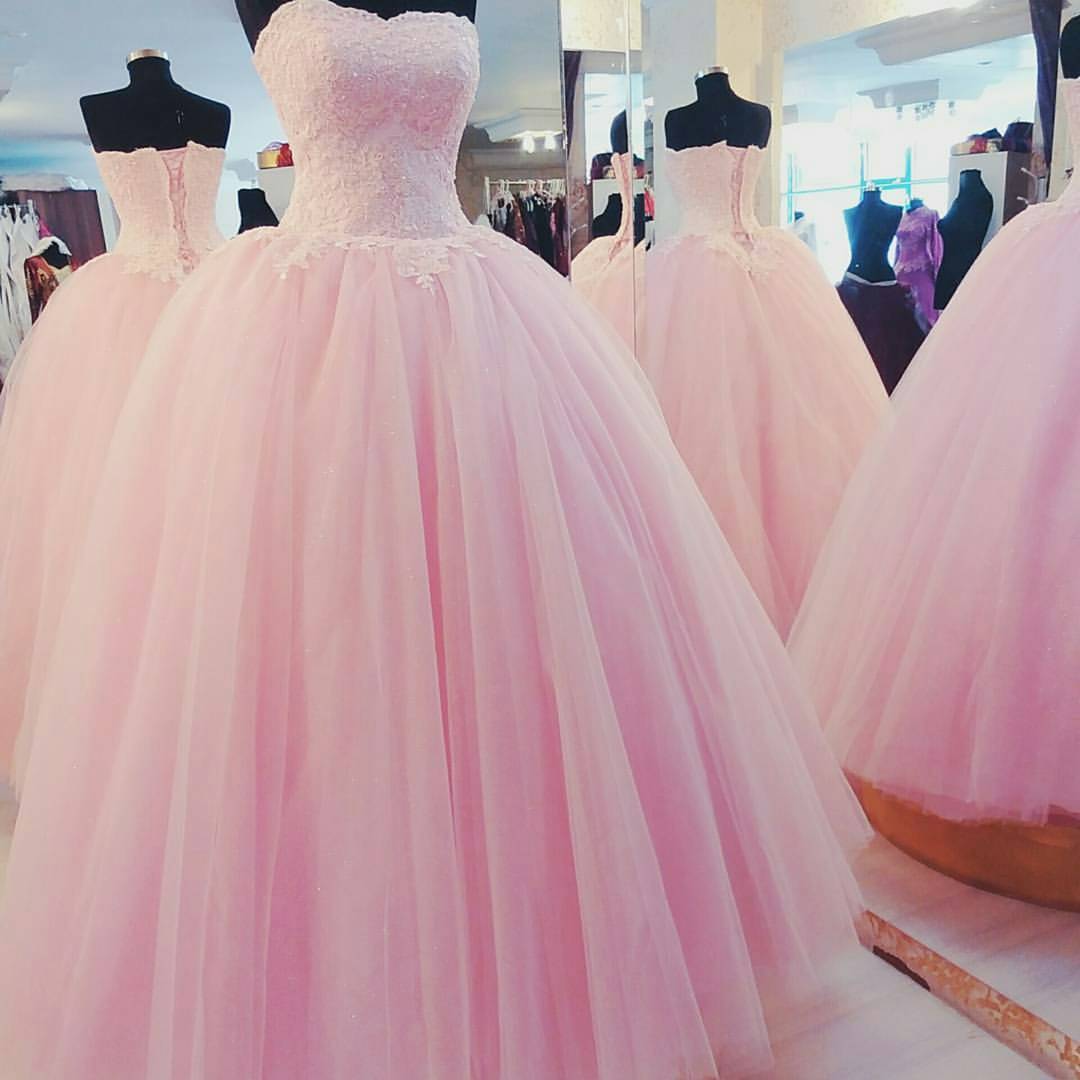 Pink Floor Length Tulle Quinceanera Gown Featuring Sweetheart Beaded Bodice