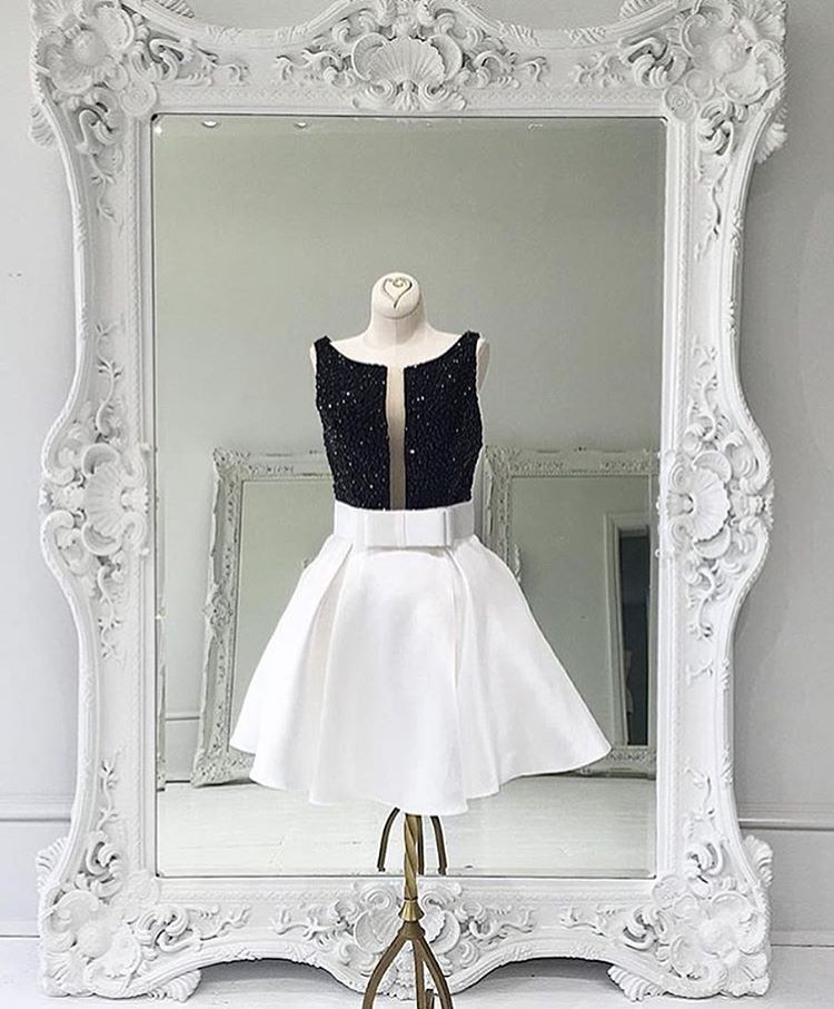 Short White Satin Dress Featuring Beaded Bodice With Bow Accent Belt