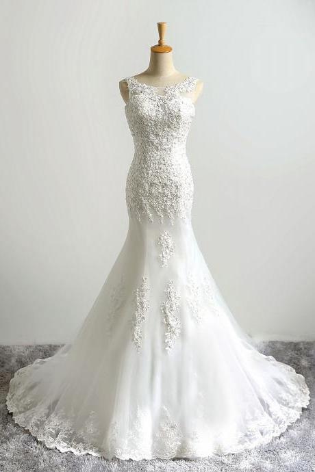 Lace Appliqué And Beaded Tulle Trumpet Wedding Dress Featuring Sheer Bateau Neckline And Lace-up Back