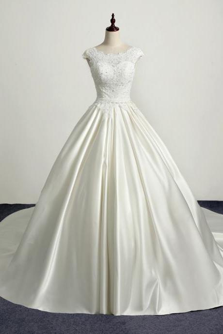 Ivory Floor Length Satin Wedding Gown Featuring Lace Bodice with Bateau Neckline, Open Back, Lace-Up Detailing and Chapel Train